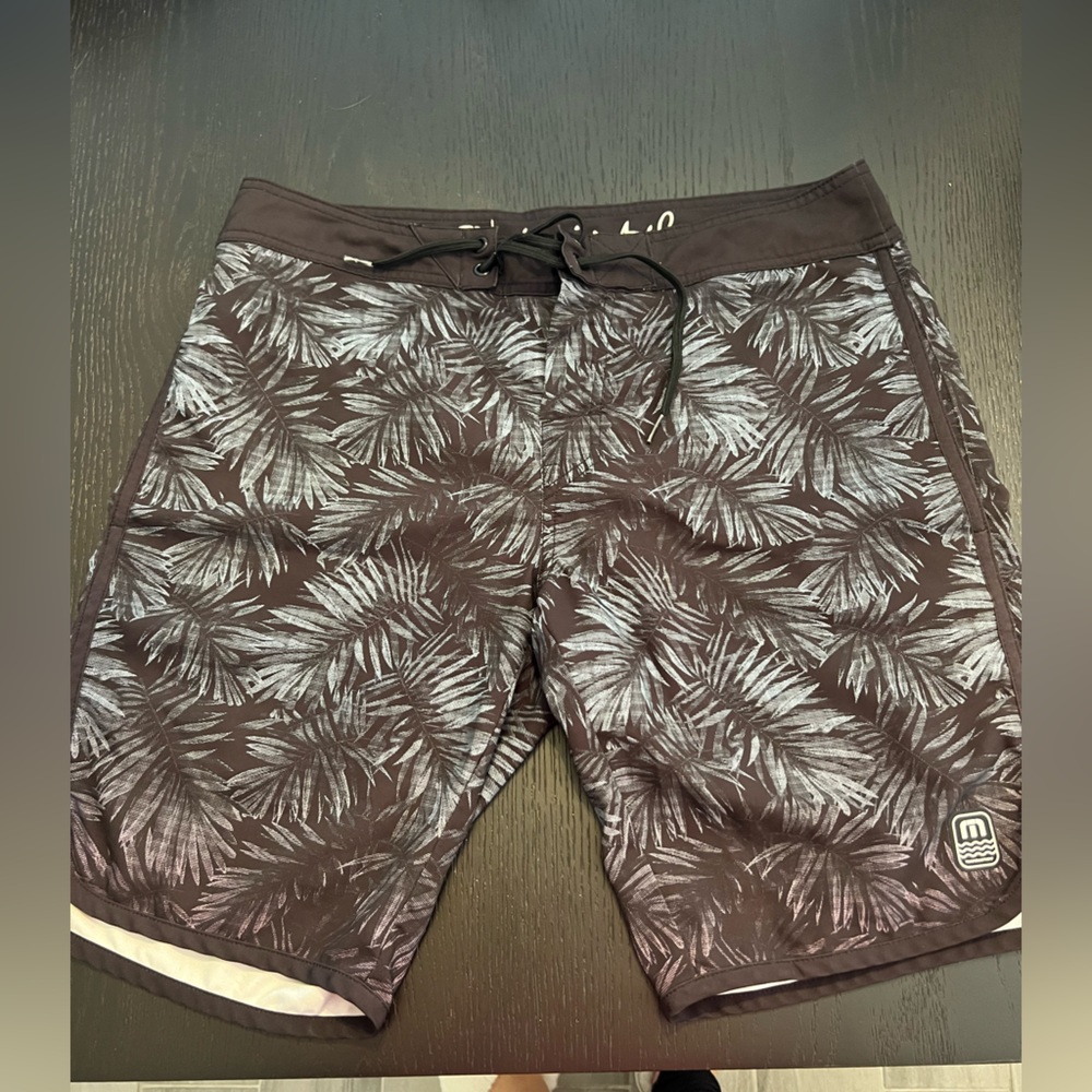 TravisMathew men’s board shorts